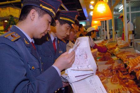 守护舌尖上的安全 超市肉制品检疫检查见闻